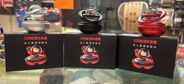 QuickMela.pk™ - Solar Car Air Freshener Rotating Double-ring Aesthetic Car Decor